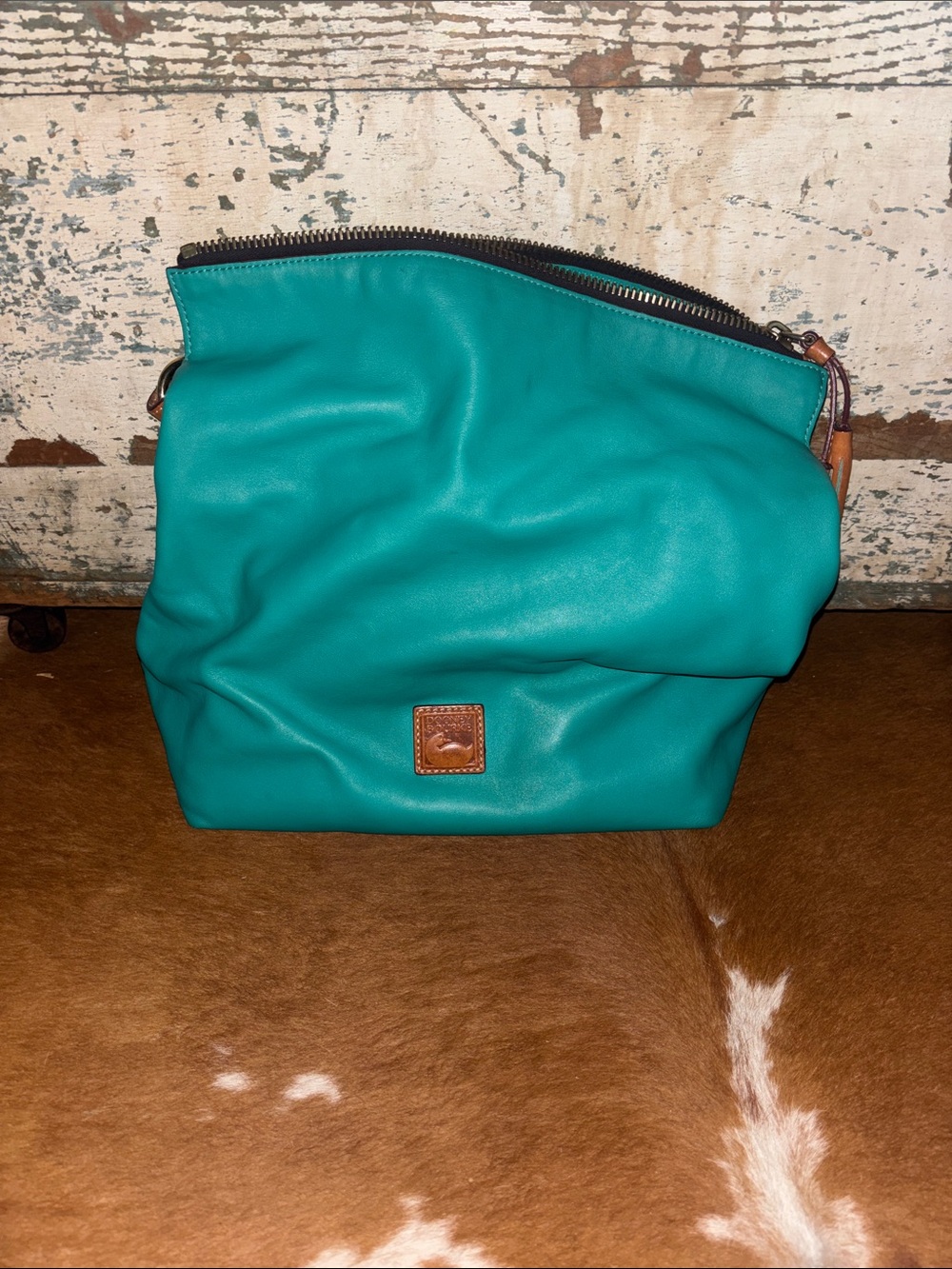Dooney & Bourke Teal Leather shoulder bag.